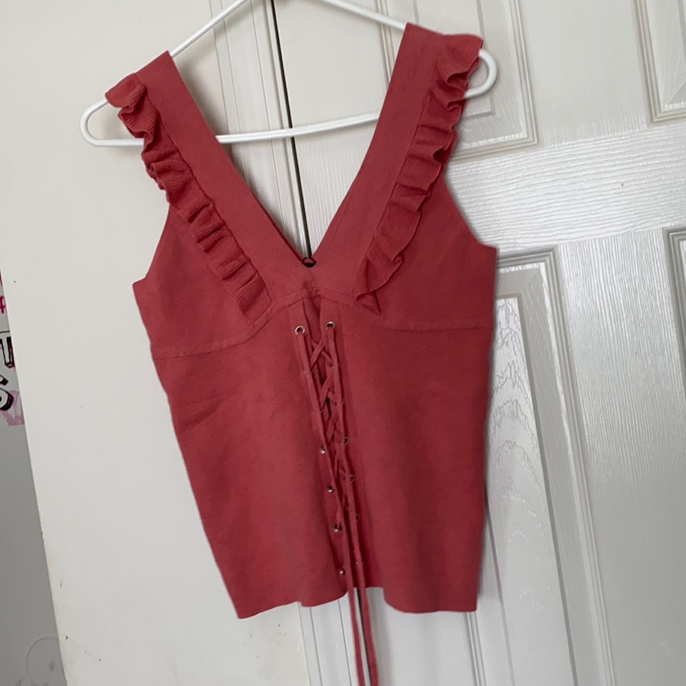A coral pinkish t-shirt blouse